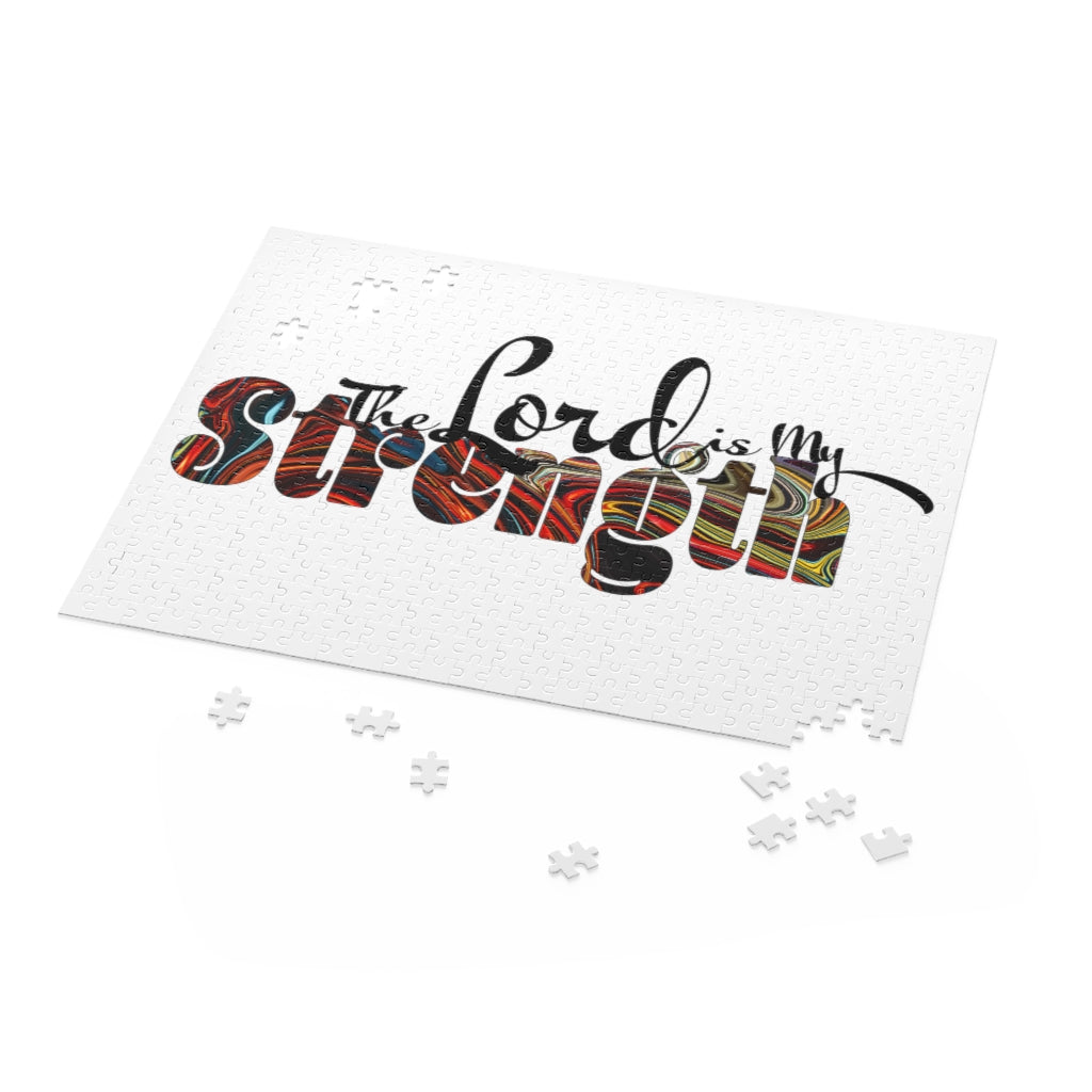 Christian Word Art jigsaw puzzle featuring 'The Lord is My Strength' in vibrant colors, made of high-quality chipboard.